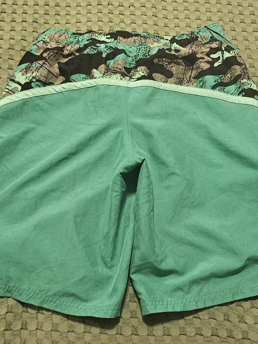 Nike Green Athletic Shorts with White Logo Tag